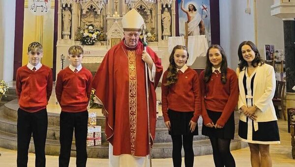Errew NS sixth class pupils at their confirmation with Archbishop Francis Duffy and their teacher Deputy Principal Kate Tiernan at the church of the Holy Rosary, Castlebar on Tuesday, April 21; L-R, Ryan Earley, Seán Joyce, Archbishop Francis Duffy, Kaylin Burns, Kailagh Mannion, Acting Deputy Principal Kate Tiernan. 