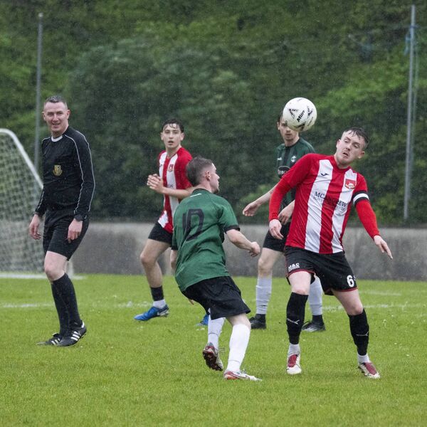 Conor Gorman (10), who scored the opening goal of the game for Conn Rangers, in a battle for possession with Darren Murray of Ballyglass.	Pictures: John Corless