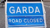 Road closed after man seriously injured overnight