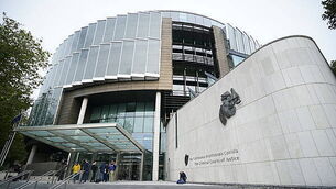 Woman dies and man seriously injured in car and bus crash in Co Antrim