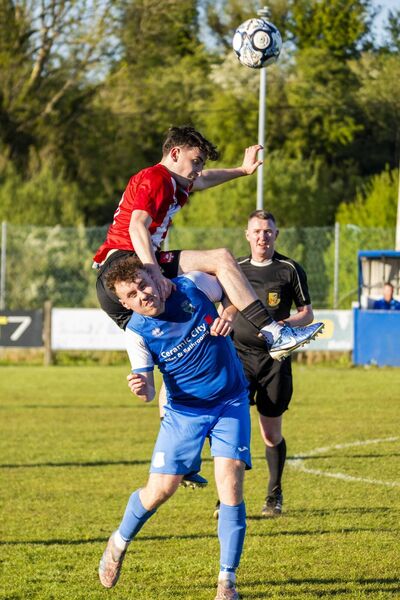 Eddie Lennon of Ballyglass climbs over Manulla’s James Dunne. Eddie Lennon of Ballyglass climbs over Manulla’s James Dunne.