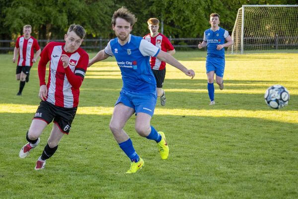 Ballyglass captain Darren Murray looks to get past Manulla's Niall Barrett. Ballyglass captain Darren Murray looks to get past Manulla's Niall Barrett.