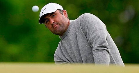 Scottie Scheffler grabs share of US PGA lead while Rory McIlroy struggles