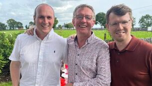 <p>Hugh Lynn (middle) with son David (right) who is running two marathons in aid of the Alzheimer Society of Ireland, after his dad was diagnosed with the brain disorder. </p>