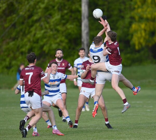 Crossmolina and Breaffy players challenge for possession at midfield during the Mayo SFL Division 1 tie last Saturday evening.	Pictures: David Farrell Phodtography