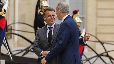 Taoiseach greeted by French president on arrival for talks in Paris
