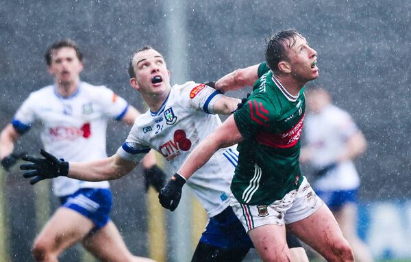 Monaghan's Jack McCarron and Ryan O'Donoghue of Mayo battle each other and the conditions during this season's National Football League Division 1 match at St Tiernach's Park. Picture: INPHO/Tom Maher Monaghan's Jack McCarron and Ryan O'Donoghue of Mayo battle each other and the conditions during this season's National Football League Division 1 match at St Tiernach's Park. Picture: INPHO/Tom Maher