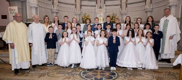 Pupils from St Aidan’s National School, Kiltimagh with Fr Michael Quinn (right), Deacon Martin Lynch and Fr Pat Lynch, after receiving their first Holy Communion last week. Picture: John Corless Pupils from St Aidan’s National School, Kiltimagh with Fr Michael Quinn (right), Deacon Martin Lynch and Fr Pat Lynch, after receiving their first Holy Communion last week. Picture: John Corless
