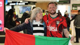 <p>Padraig O'Hora with his mother Breeda Doyle as he arrived home at Dublin Airport after successfully summiting Mount Everest. He was part of the first all-Irish team in more than 20 years to reach the world’s highest peak. Picture: Brian McEvoy</p>