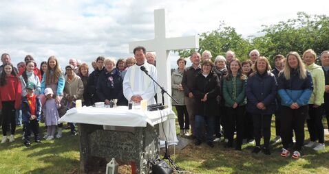Local Notes: Locals gather at Lios na Leannaí, Culliagh, Kilmovee, to celebrate Mass.