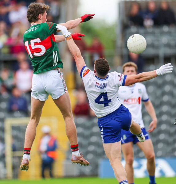 Kobe McDonald scores Mayo's first-half goal despite the attentions of Monaghan defender Dylan Byrne. Picture: James Crombie