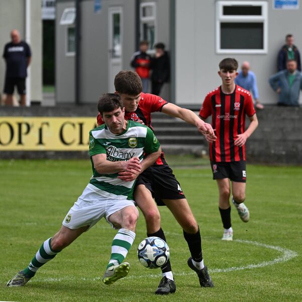 Celtic's Johnny Cocozza beats Noah Masseyof Westport to the ball.