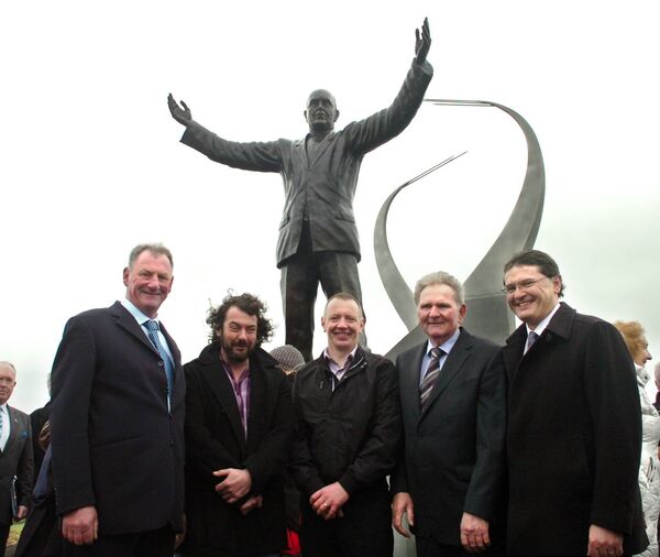 Attending the unveiling of the Mgr Horan statue at Ireland West Airport Knock in 2013 were, from left: Mgr Horan's nephew and stonemason Jimmy Moran who with sculptor Barry Linnane worked on the project, Noel Jennings, who instigated the project, Frank Harrington and Ireland West Airport Manager Joe Gilmore. 	Picture: Henry Wills Archive