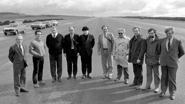 <p>Pictured on the runway of Knock Airport for a public open day in September 1983 after the first section of the runway was laid were, from left: Jim Ryan, airport director; Pat English, site engineer; Mick Ruddy, general foreman; Paddy McDonnell, site agent; Monsignor James Horan, Frank Harrington, Seán Balfe, consultant engineer; Chris Lysaght, An Foras Forbartha (National Institute for Physical Planning and Construction Research), Paul Crowe, site engineer; PJ Durkan, foreman. Missing from photo, John Corcoran, surfacing foreman.	 Picture: Henry Wills/Western People Archives</p>