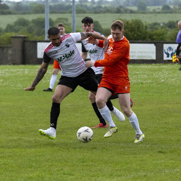 Rodrigo Rosado Da Costa of Ballinrobe Town battles for possession with Bryan Walsh of Ballyglass. Picture: John Corless Rodrigo Rosado Da Costa of Ballinrobe Town battles for possession with Bryan Walsh of Ballyglass. Picture: John Corless