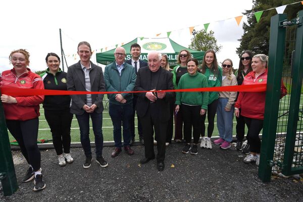 Fr Tommy Johnson cuts the tape on the new athletics track and facilities in Charlestown last Sunday. Also included are Minister Alan Dillon TD, Paul Lawless TD, Cllr Gerry Murray, Irish athlete Kate O’Connell, and East Mayo Athletic Club committee members. Fr Tommy Johnson cuts the tape on the new athletics track and facilities in Charlestown last Sunday. Also included are Minister Alan Dillon TD, Paul Lawless TD, Cllr Gerry Murray, Irish athlete Kate O’Connell, and East Mayo Athletic Club committee members.