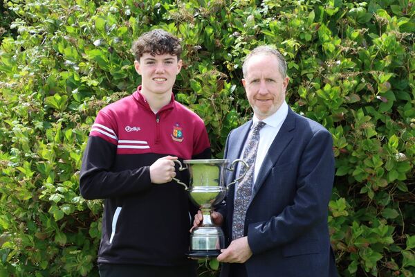Congratulations to Gavin McAndrew from Pullathomas on winning the Student of the Year award at Our Lady's Secondary School in Belmullet. He is pictured recently receiving the Gerard McNally Memorial Cup from principal Edmund Holmes. Congratulations to Gavin McAndrew from Pullathomas on winning the Student of the Year award at Our Lady's Secondary School in Belmullet. He is pictured recently receiving the Gerard McNally Memorial Cup from principal Edmund Holmes.