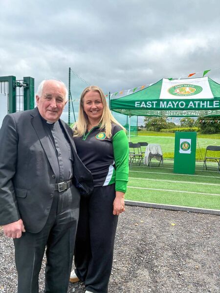 Fr Tommy Johnson pictured with Gemma Higgins, one of the leading lights in the East Mayo Athletics Club and one of the main drivers behind the campaign to get the new track built. Fr Tommy Johnson pictured with Gemma Higgins, one of the leading lights in the East Mayo Athletics Club and one of the main drivers behind the campaign to get the new track built.
