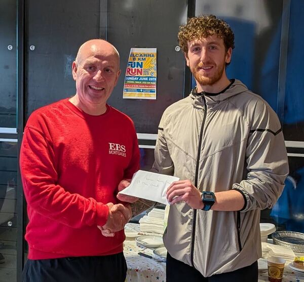 Aidan Beirne, on behalf of sponsors EBS, presents Lorcan Murray of Mayo AC with his prize as the leading man in the 2026 Mayo AC 5k Series. Picture: Tom Hunt Aidan Beirne, on behalf of sponsors EBS, presents Lorcan Murray of Mayo AC with his prize as the leading man in the 2026 Mayo AC 5k Series. Picture: Tom Hunt