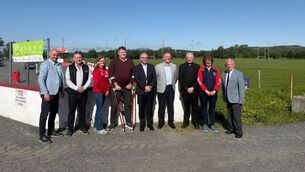 <p>Minister for Rural and Community Development and the Gaeltacht Dara Calleary TD pictured at Sraith Garbh with executive officers of Moy Davitts GAA Club and local public representatives to mark the allocation of €95,255 from the Climate Action Fund. The club will use the funding to provide an integrated upgrade to cut electricity use and embed circularity and active travel across the club. Pictured are Cllr Adrian Forkan, Mark Reape, Bernie Byron, Cllr Neil Cruise, Minister Dara Calleary, Willie Byrne (chairperson), Fr Padraic Costello (patron), Teresa Mulligan and Cathal Hennelly (president). </p> <p>Minister for Rural and Community Development and the Gaeltacht Dara Calleary TD pictured at Sraith Garbh with executive officers of Moy Davitts GAA Club and local public representatives to mark the allocation of €95,255 from the Climate Action Fund. The club will use the funding to provide an integrated upgrade to cut electricity use and embed circularity and active travel across the club. Pictured are Cllr Adrian Forkan, Mark Reape, Bernie Byron, Cllr Neil Cruise, Minister Dara Calleary, Willie Byrne (chairperson), Fr Padraic Costello (patron), Teresa Mulligan and Cathal Hennelly (president). </p>
