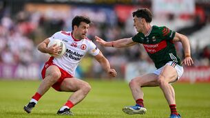 <p>Darren McCurry of Tyrone in action against Jack Coyne of Mayo at O’Neills Healy Park in Omagh.	Picture: Ramsey Cardy/Sportsfile</p>