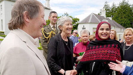 Cowboy hats and summer dresses at President’s first garden party