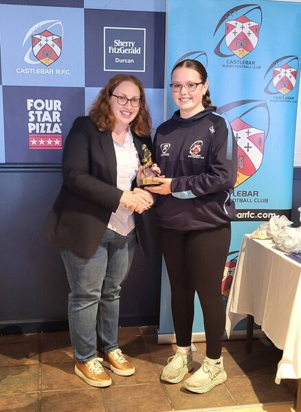 Michaela Kilcoyne receives her prize as the most improved player on Castlebar's U16 girls team from club president Mairéad Bradley. Michaela Kilcoyne receives her prize as the most improved player on Castlebar's U16 girls team from club president Mairéad Bradley.