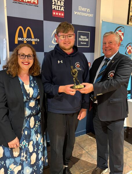Incoming president Mairéad Bradley and outgoing president Kevin McGing with Danann Mekitarian, U17 Most Improved Player. Incoming president Mairéad Bradley and outgoing president Kevin McGing with Danann Mekitarian, U17 Most Improved Player.