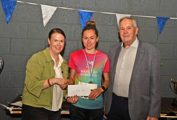 Aisling Moyles, winner of the women's 10k at the annual Ronan Clarke Memorial Run in Killala, with Laurita Blewitt and Sean Clarke. Aisling Moyles, winner of the women's 10k at the annual Ronan Clarke Memorial Run in Killala, with Laurita Blewitt and Sean Clarke.