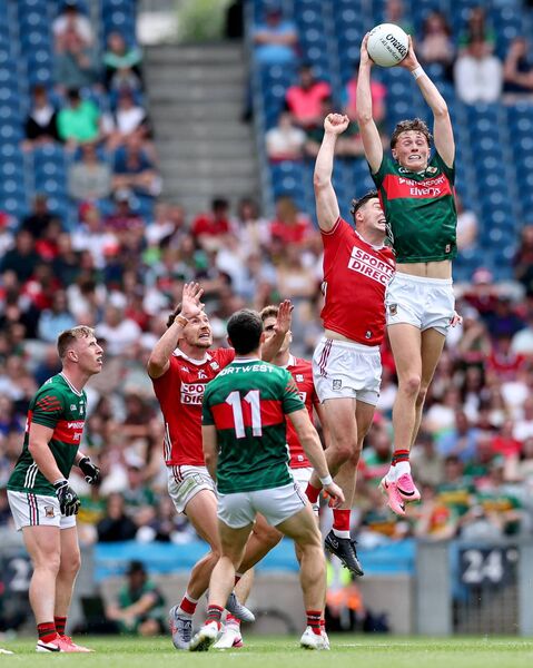 Kobe McDonald claims a high ball for Mayo during their All-Ireland SFC quarter-final win against Cork at Croke Park on Saturday.	Pictures: INPHO/James Crombie