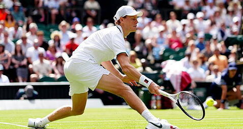 Jannik Sinner bloodied as he survives scare in fierce five-set Wimbledon opener