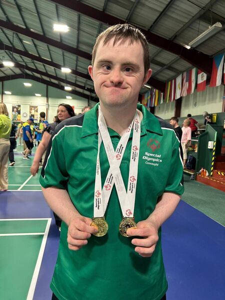 James Gough with his two medals won at the Special Olympics Summer Games. James Gough with his two medals won at the Special Olympics Summer Games.