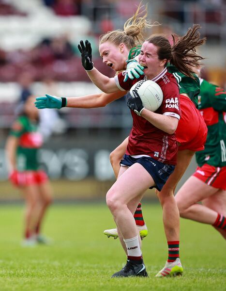 Nicola Ward of Galway is tackled by Mayo's Hannah Reape. Nicola Ward of Galway is tackled by Mayo's Hannah Reape.