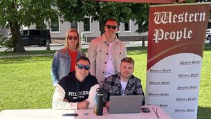 <p>Tom Byrne (seated on right) at the Mayo.ie Western People Women's Mini Marathon in Castlebar in 2025 with colleagues Michael Marigliano, Elaine Arthur and Stuart Tynan.</p> <p>Tom Byrne (seated on right) at the Mayo.ie Western People Women's Mini Marathon in Castlebar in 2025 with colleagues Michael Marigliano, Elaine Arthur and Stuart Tynan.</p>