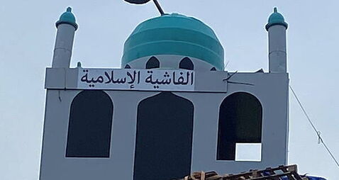 Police say mosque replica on top of loyalist bonfire is hate crime
