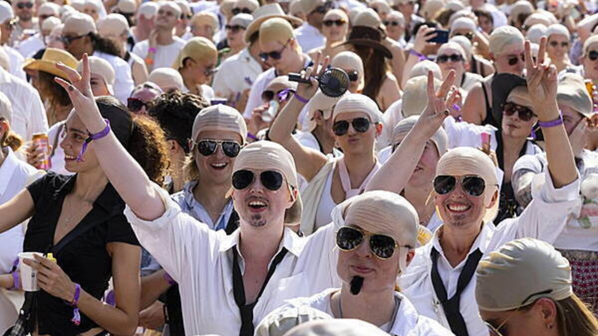 Mr World Record: Pitbull recognised for largest gathering of people in bald caps
