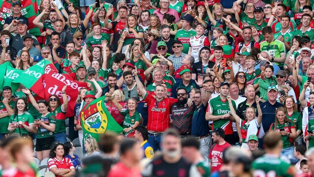 <p>Mayo fans celebrate after their county defeated Louth in the GAA All-Ireland Senior Football Championship Semi-Final at Croke Park on Saturday, July 11th.	Picture: INPHO/James Crombie</p>