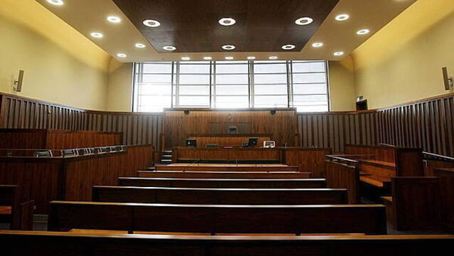 Robber jailed after driving car at victim and breaking his leg