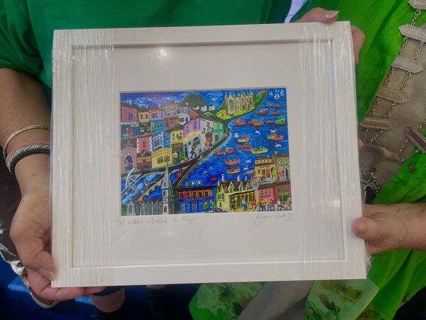 'Out and About in Ballina' by Simone Walsh, gifted to the Pittsfield delegation by Cathaoirleach Cllr Annie May Reape and the Ballina Municipal District. 'Out and About in Ballina' by Simone Walsh, gifted to the Pittsfield delegation by Cathaoirleach Cllr Annie May Reape and the Ballina Municipal District.