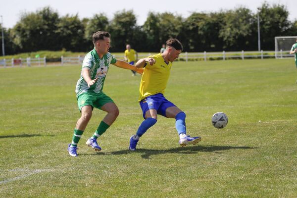Killala's Tommy Muldoon holds off Kilmore's Patrick Sweeney. Picture: Colin Redmond Killala's Tommy Muldoon holds off Kilmore's Patrick Sweeney. Picture: Colin Redmond