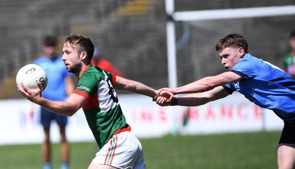 Ballina Stephenites David Tighe gets in a tangle with Westport’s Killian Kilkelly during the AbbVie Mayo SFL Division 1 final at Hastings Insurance MacHale Park last Sunday. Picture: David Farrell Photography Ballina Stephenites David Tighe gets in a tangle with Westport’s Killian Kilkelly during the AbbVie Mayo SFL Division 1 final at Hastings Insurance MacHale Park last Sunday. Picture: David Farrell Photography