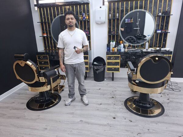 Lukas De Sousa in his recently owned barber shop in Ballyhaunis. Lukas De Sousa in his recently owned barber shop in Ballyhaunis.