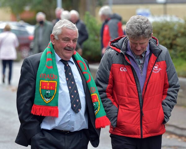 Sean Lyons, left in scarf, in 2021 when he delivered an oration at the funeral of Paddy Prendergast, the last surviivng member of the Mayo team that won the All-Ireland in 1951, in St John's Church, Tralee, Picture: Don MacMonagle Sean Lyons, left in scarf, in 2021 when he delivered an oration at the funeral of Paddy Prendergast, the last surviivng member of the Mayo team that won the All-Ireland in 1951, in St John's Church, Tralee, Picture: Don MacMonagle