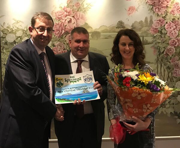 Claremorris native Pat McTigue (left) pictured with his wife Aine (right) and Patrick O’Sullivan, chairperson of Kerry County Board (centre). Claremorris native Pat McTigue (left) pictured with his wife Aine (right) and Patrick O’Sullivan, chairperson of Kerry County Board (centre).