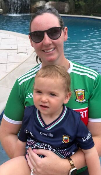 Claremorris native Amy Brett and her daughter Evie sporting the Mayo colours in New York. Claremorris native Amy Brett and her daughter Evie sporting the Mayo colours in New York.