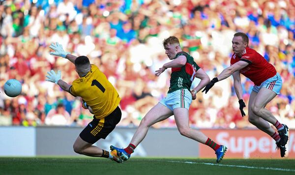 Darragh Beirne of Mayo scores his side's second goal past Louth goalkeeper Niall McDonnell during the GAA Football All-Ireland Senior Championship semi-final. Picture: Ramsey Cardy/Sportsfile Darragh Beirne of Mayo scores his side's second goal past Louth goalkeeper Niall McDonnell during the GAA Football All-Ireland Senior Championship semi-final. Picture: Ramsey Cardy/Sportsfile