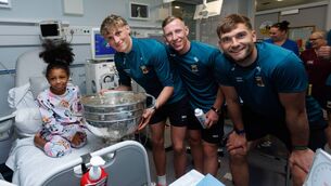 <p>Amy Lily Cusack with Kobe McDonald, Ryan O'Donoghue and Aidan O'Shea. Pic:INPHO/Tom Maher</p>