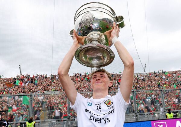 Kobe McDonald celebrates with the Sam Maguire Cup in front of the Mayo fans on Hill 16.	Picture: INPHO/Ryan Byrne
