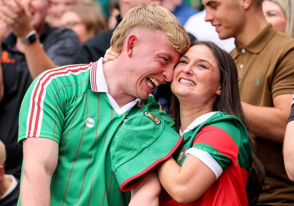 Mayo fans celebrating at the end of the All-Ireland Senior Football Championship Final. Picture: INPHO/Ryan Byrne
Mayo fans celebrating at the end of the All-Ireland Senior Football Championship Final. Picture: INPHO/Ryan Byrne