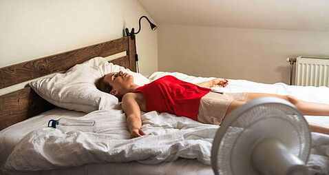 Should I sleep with a fan on? Here are the pros and cons